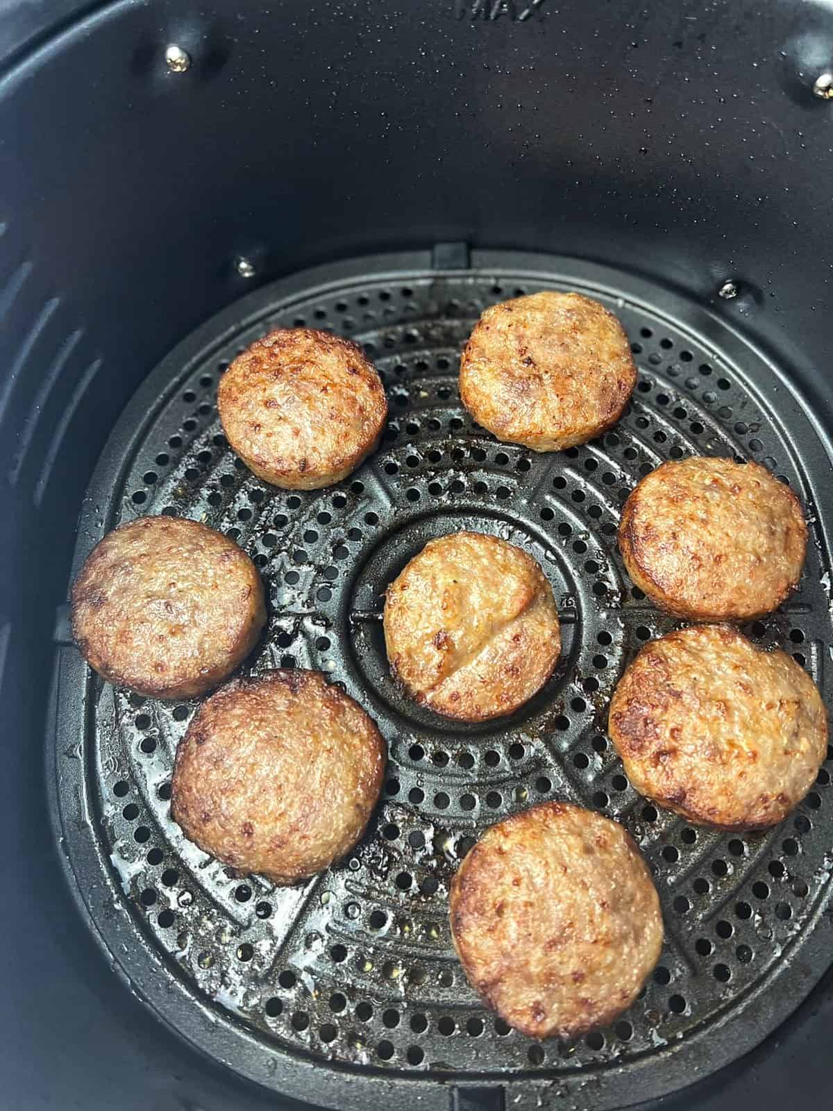 cooked and shown in air fryer basket.